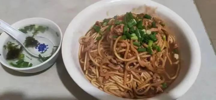 DƬ